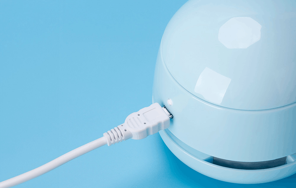 Mini cordless desktop vacuum cleaner with micro USB charging